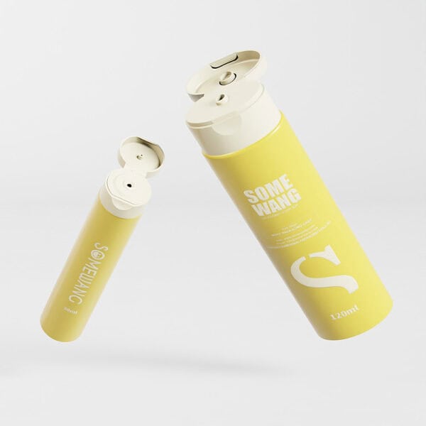 Two yellow plastic tubes labeled "SOME WANG" and "SOMETHING," with white caps, float on a plain background.