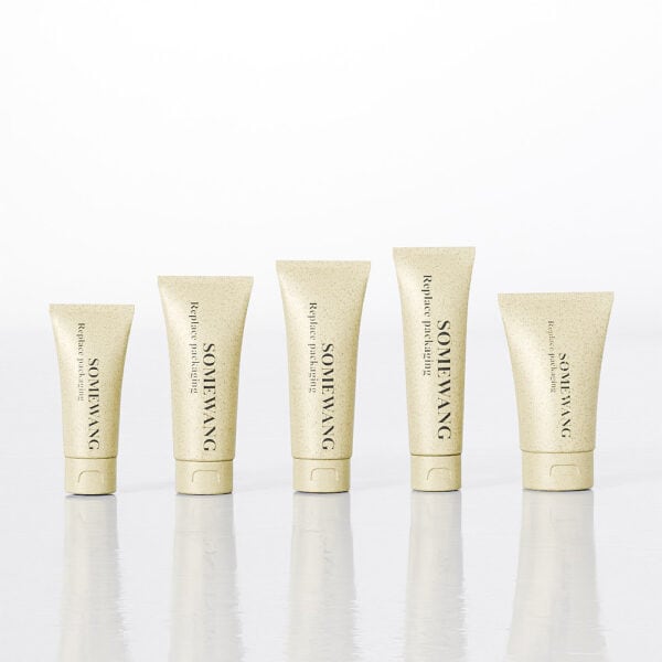 Five "SOMEIWANG" skincare D40mm D16mm D25mm D19mm PE tubes stand on a reflective surface against a white background.