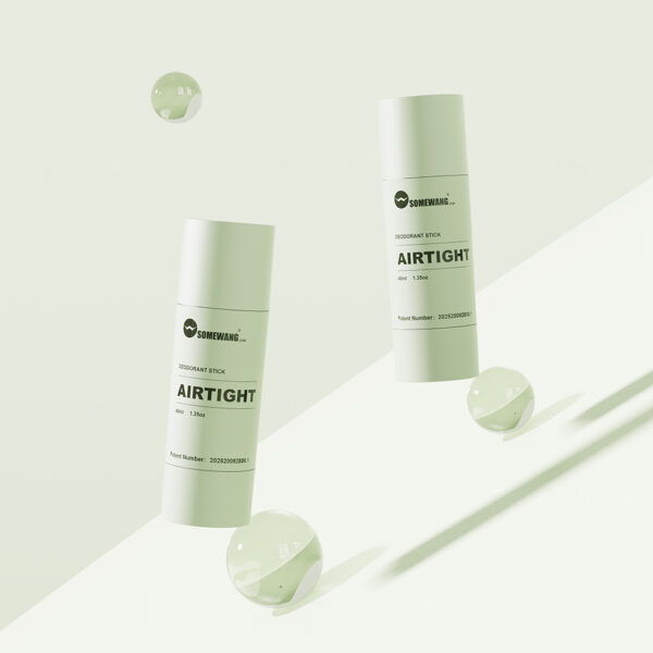 Due deodoranti stick "AIRTIGHT" da 40 g in PP fluttuano elegantemente con tre sfere trasparenti su uno sfondo verde chiaro.