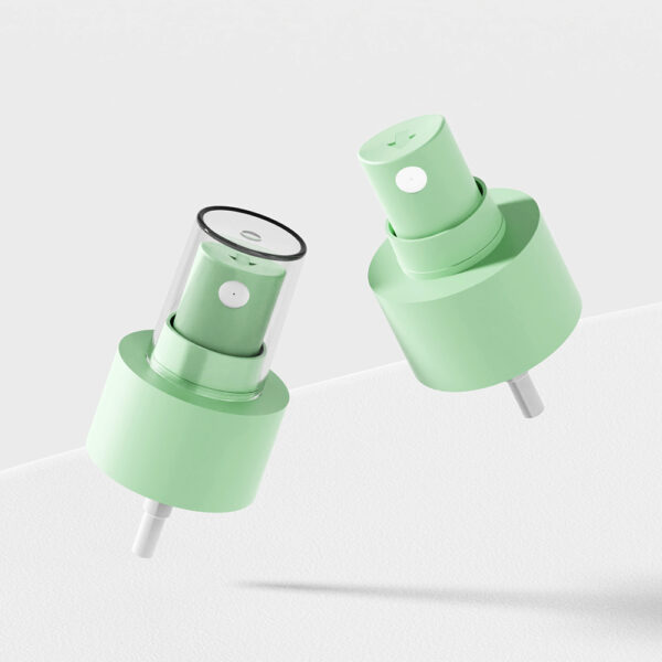 Against a light gray backdrop, two green plastic nozzles fit seamlessly on 18/410 necks.