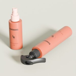 Two coral spray bottles labeled "Customized 100ml HDPE & 100ml +190ml PET Bottle," stand upright and lying down on a gray background.
