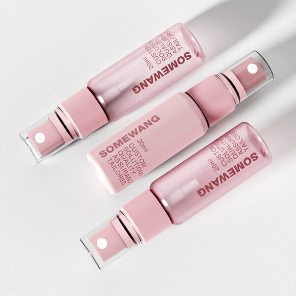Three pink "SOMEWANG 20ml custom solution" spray bottles are arranged diagonally on a light pink background.