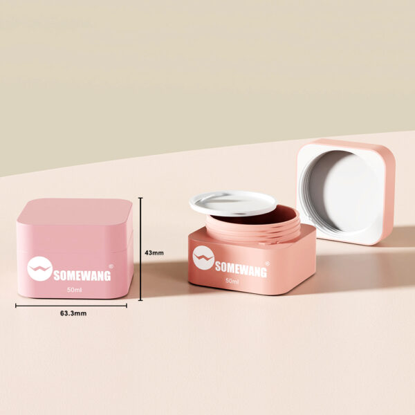 Two pink square plastic jars, "SOMEWANG 50ml": one closed, one open. Size: 63.3mm x 43mm.