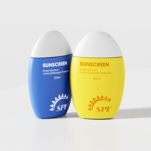 Custom 50ml PE bottles for sunscreen, in blue or yellow, feature SPF and UV/blue light labels—perfect for standout packaging.