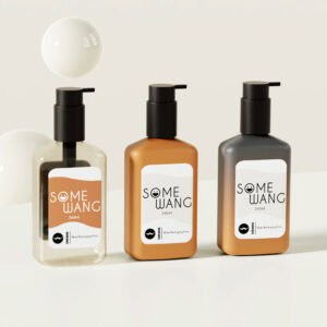 Three 240ml PET flat square shampoo bottles—clear, orange, dark gray—sit side by side with white spheres behind.