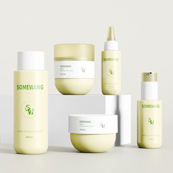 Five pale yellow and white "Somewang" cosmetic containers are displayed on blocks, previewing interCHARM Korea 2025.