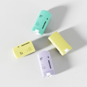 Four SOMEWANG 15ml PP deodorant sticks in pastel green, yellow, lavender, and blue-green on a white surface.