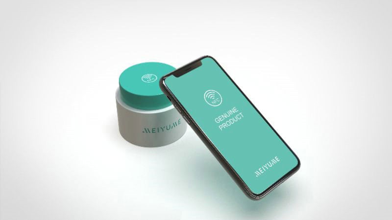 A smartphone showing "Genuine Product" beside a teal-silver "MEIYUAN" jar highlights modern beauty packaging trends.