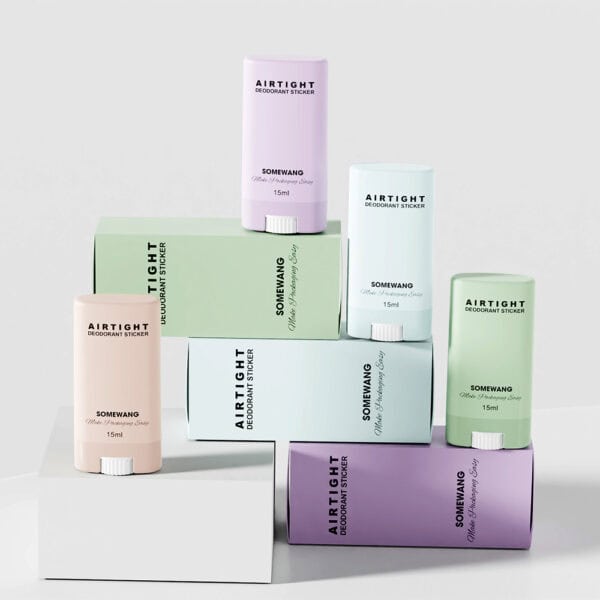 Tabung "Somewang 15ml Deodorant Stick" berwarna pastel dipajang pada balok dengan latar belakang netral.