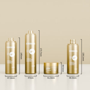 Four gold containers of varying sizes display customized personal care skincare kit packaging against a neutral background.