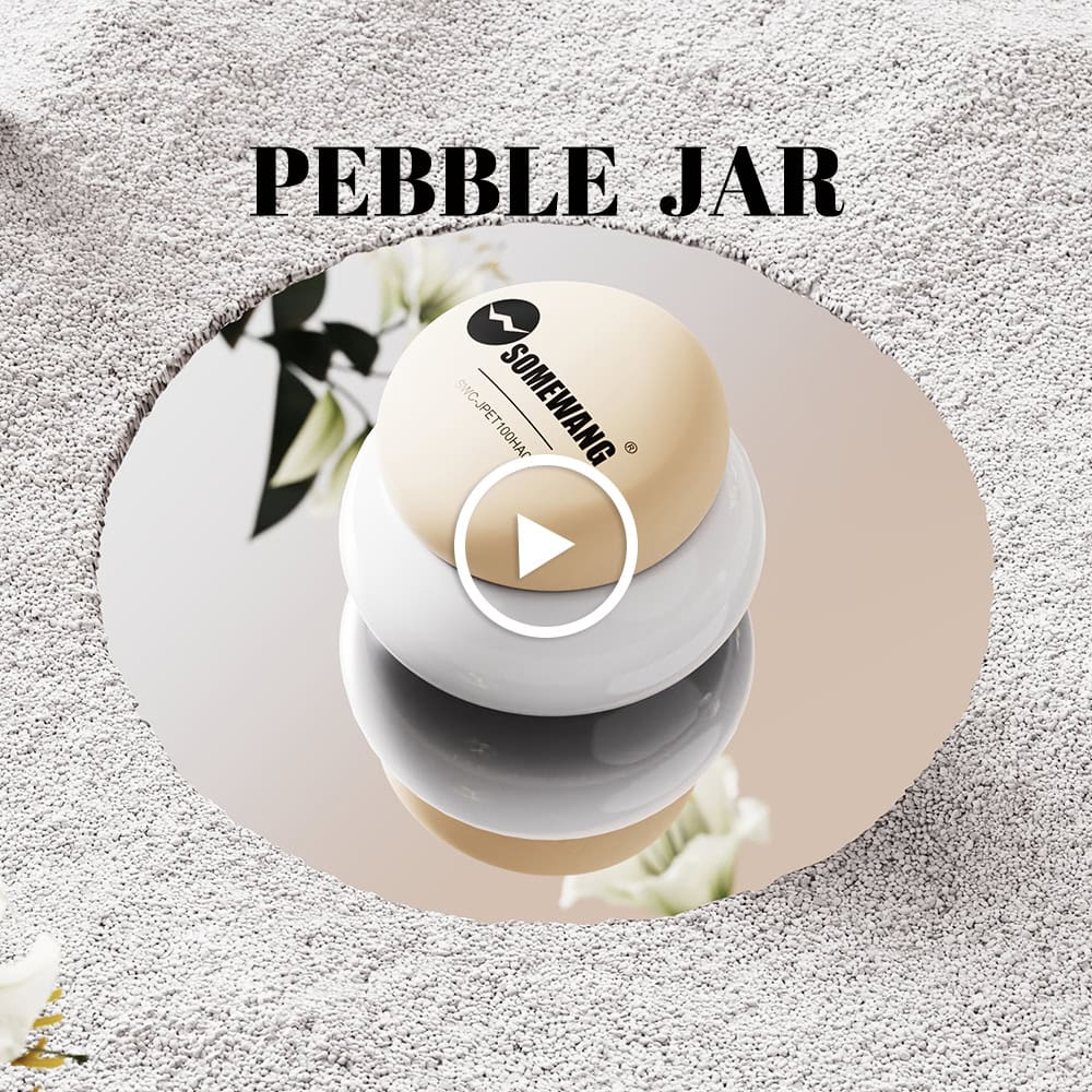 A round beige-white "SOMYAMNC" jar sits on a textured surface with reflected flowers. "PEBBLE JAR" is at the top.