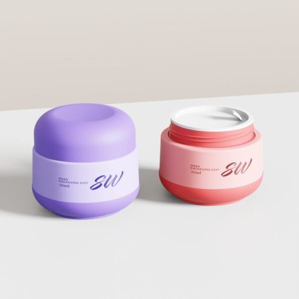 A closed purple lotion jar and an open pink jar sit on a white surface against a beige background.