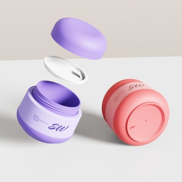 Purple lotion jar with floating lid and seal, plus a closed pink jar, on a white surface with beige background.