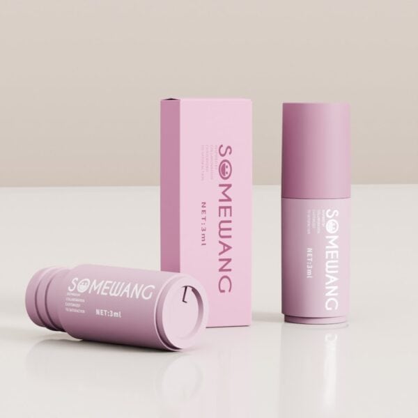 Ba chai lăn SOMEWANG 3ml màu hồng—một chai đóng hộp, một chai dựng đứng, một chai nằm—trên bề mặt trắng, nền màu be.